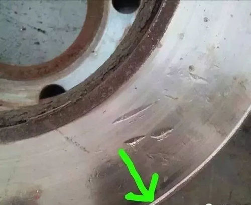 Why do garages chamfer the brake pads when installing new brake pad on old brake disc?cid=4