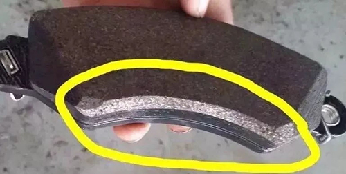 Why do garages chamfer the brake pads when installing new brake pad on old brake disc?cid=4